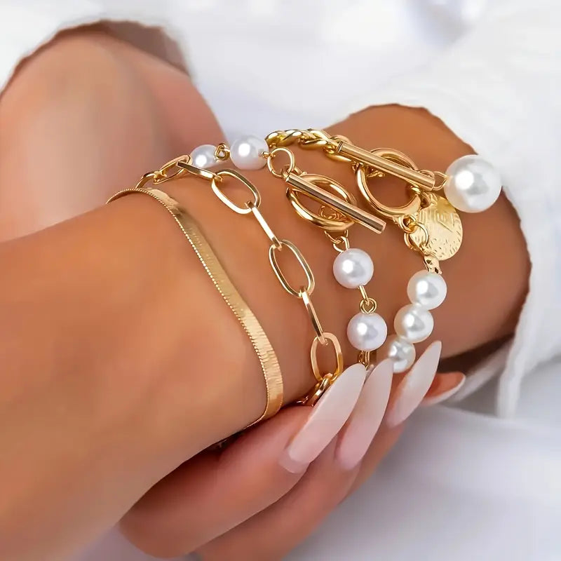 Set of 4 Chic Gold Bracelets – Snake, Pearls, and Links | Gold