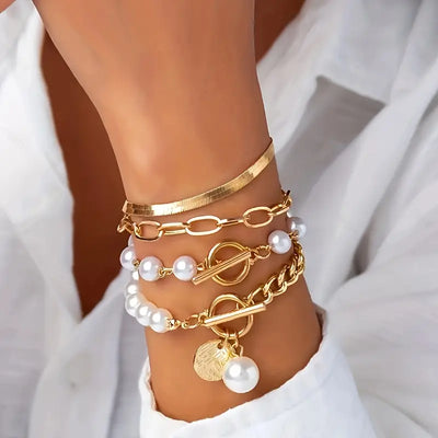 Set of 4 Chic Gold Bracelets – Snake, Pearls, and Links | Gold