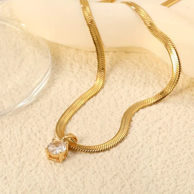 Elegant necklace with rhinestone pendant | Gold