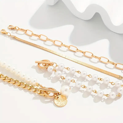 Set of 4 Chic Gold Bracelets – Snake, Pearls, and Links | Gold