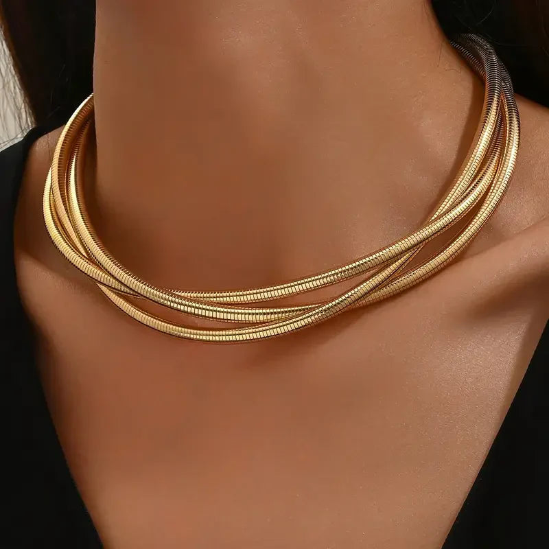 Three-strand gold necklace | Gold